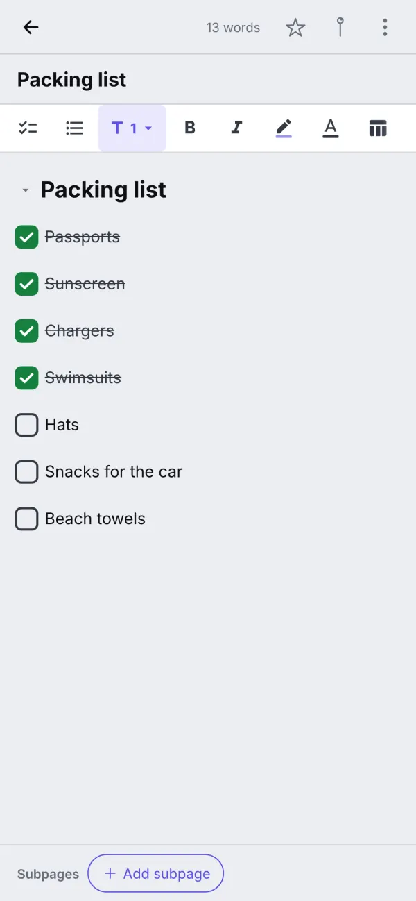 A note on a phone: a packing list with ticked checkboxes inside the Trip notebook